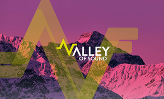 A graphic image titled "Valley of Sound". In the background, impressive mountains in purple and pink tones can be seen, with modern, colorful graphic elements in the foreground.