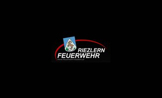 A logo of the Riezlern Fire Department. It features a coat of arms with a goat image and the name "FIRE DEPARTMENT". | © Feuerwehr Riezlern Logo